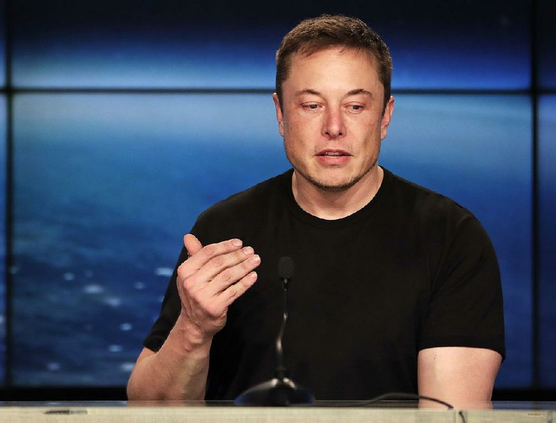 In this Feb. 6, 2018, file photo, Elon Musk, founder, CEO of SpaceX and CEO of Tesla Inc., speaks at a news conference after the Falcon 9 SpaceX heavy rocket launched successfully from the Kennedy Space Center in Cape Canaveral, Fla. 