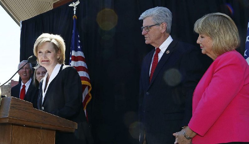 Mississippi Agriculture Commissioner Cindy Hyde-Smith (left) appears with Gov. Phil Bryant on Wednesday after he selected her to succeed fellow Republican Thad Cochran in the U.S. Senate.  