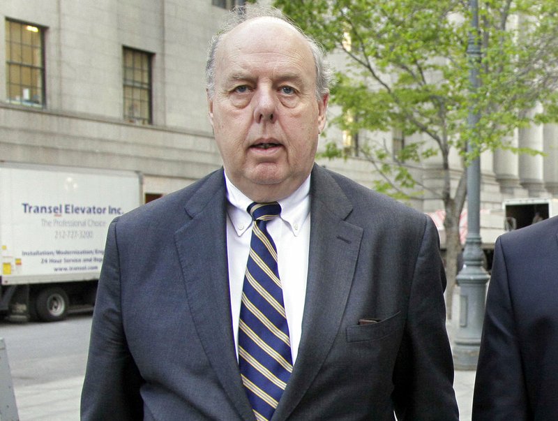 In this April 29, 2011, file photo, attorney John Dowd walks in New York.