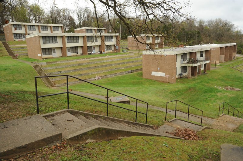 File Photo/NWA Democrat-Gazette/ANDY SHUPE The Willow Heights public housing complex was built into the hillside west of the Confederate Cemetery in Fayetteville and features terraces and steep stairs.