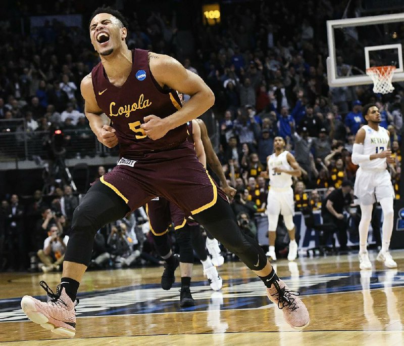 Loyola-Chicago’s Marques Townes celebrates after making a three-pointer late in the Ramblers’ victory over Nevada on Thursday in the South Regional semifi nals of the NCAA Tournament at Atlanta.