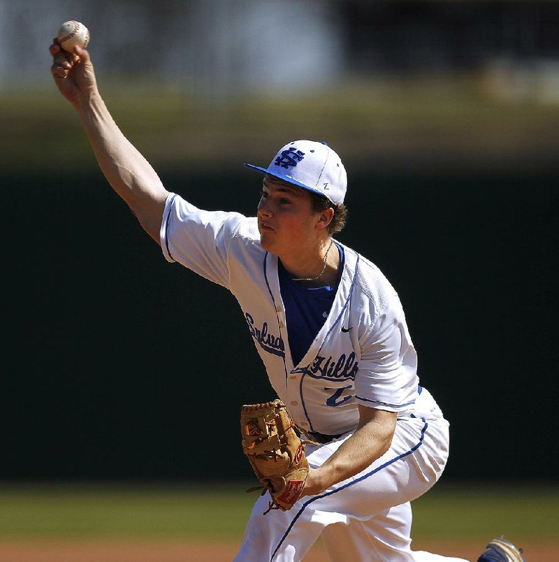 Sylvan Hills’ Ryan Lumpkin delivers a pitch during the Bears’ 10-0 victory Thursday at the Central Arkansas Invitational. The Bears later defeated Springdale 14-6.