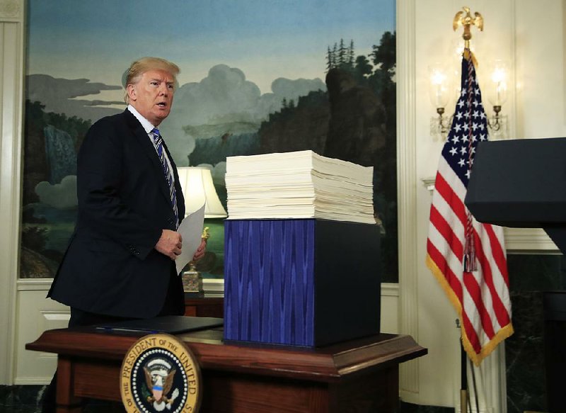 “I say to Congress, I will never sign another bill like this again,” President Donald Trump said, criticizing the spending bill that he viewed as too hastily put together.