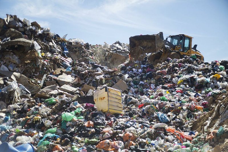 A tractor works in a landfill near the UBQ factory in Kibbutz Zeelim in Israel.
