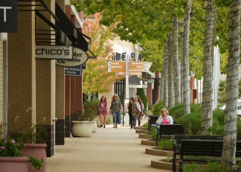 File Photo/NWA Democrat-Gazette/BEN GOFF @NWABENGOFF Shoppers walk at Pinnacle Hills Promenade mall in Rogers.