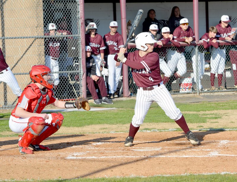 Graham Thomas/Siloam Sunday Siloam Springs third baseman Chance Hilburn takes a cut against Clarksville in a game on March 13. The Panthers are scheduled to host Russellville at 5 p.m. Tuesday in a 5A/6A District 1 game.