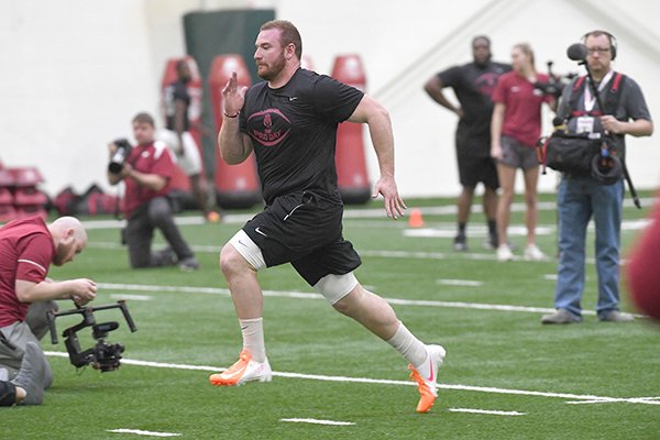 Arkansas offensive lineman Frank Ragnow runs during the Razorbacks' Pro Day on Monday, March 26, 2018, in Fayetteville. 