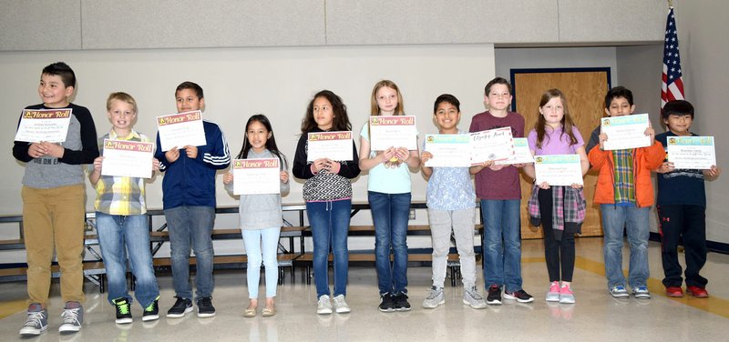 Westside Eagle Observer/MIKE ECKELS Rebekah Fisher's fourth-grade class third-quarter honor students include Andres Gonzalez (left), Milo Moore, Giovanni Puga, McKenzie Thao, Sunshine Thor, Nadia Willis, John Colorado, Jayden Cox, Mallissa Frye, Alexis Garcia and Brandon Vang.