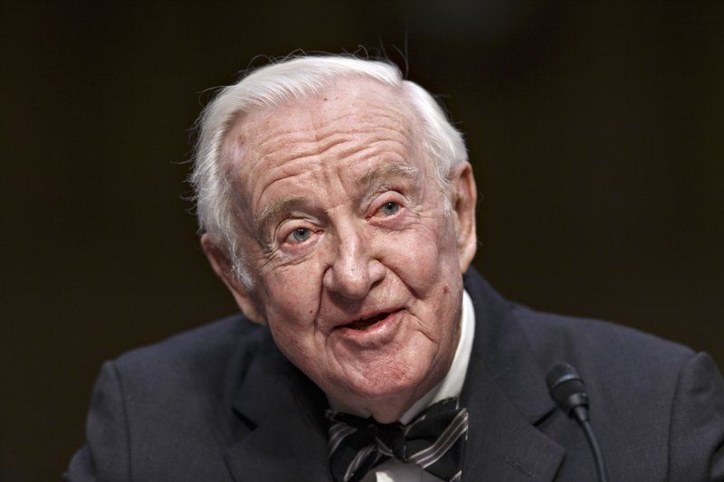 In this April 30, 2014, file photo, retired Supreme Court Justice John Paul Stevens testifies on the ever-increasing amount of money spent on elections as he appears before the Senate Rules Committee on Capitol Hill in Washington.