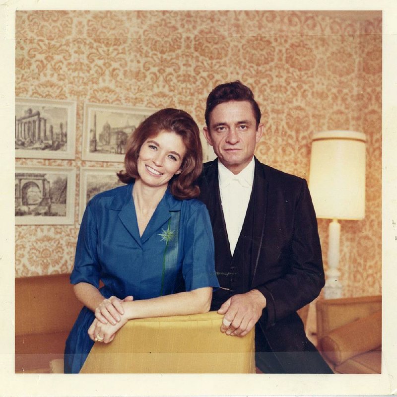 Johnny Cash poses with his wife, June Carter Cash, in this undated photo. Archivists in Arkansas were surprised to learn that Cash’s artifacts could one day reside in Tulsa, alongside those of Woody Guthrie and Bob Dylan.