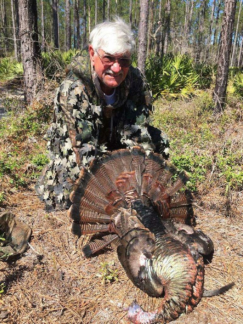 Jackie Rauls of Rison started his quest for his ninth North American Grand Slam by killing this Osceola turkey in Florida while hunting with Wayne Richardson of Rison.