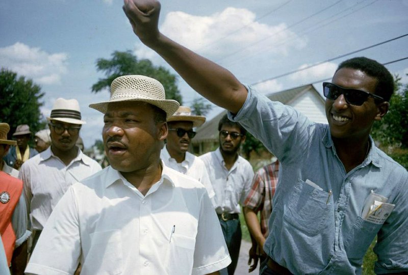 This 1966 image released by HBO shows Dr. Martin Luther King, Jr., left, and Stokely Carmichael in Jackson, Miss., at the Meredith March, used in the documentary, &quot;King in the Wilderness.&quot; (Bob Fitch, Stanford University Libraries/HBO via AP)