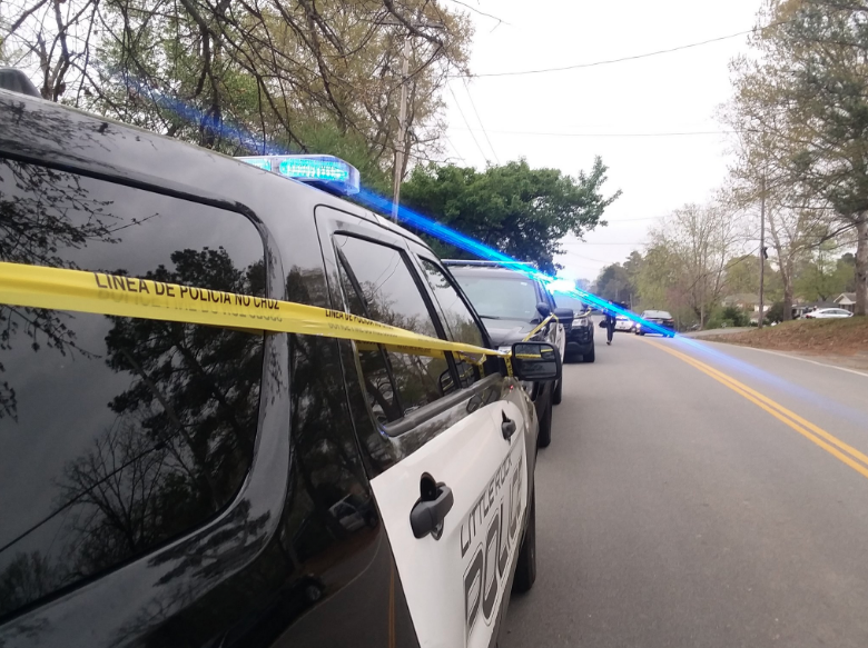 Police work the scene of a homicide in Little Rock on Sunday night.