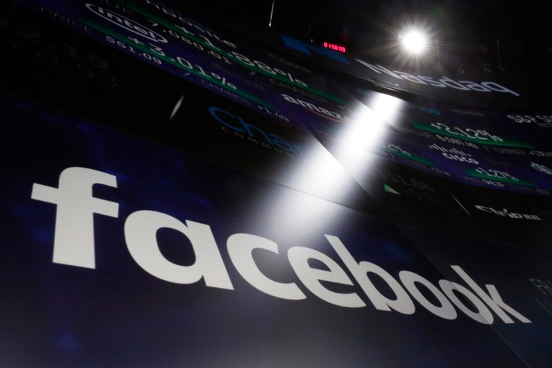 The logo for Facebook appears on screens at the Nasdaq MarketSite in New York's Times Square, Thursday, March 29, 2018. Facebook&#x2019;s decision to stop working with third-party data collectors might earn it public-relations points, but it does little to protect your privacy. The social network still has more than enough data on your interests and hobbies to target ads with precision. (AP Photo/Richard Drew)