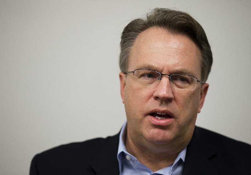 In this Oct. 30, 2015, file photo John Williams, president of the Federal Reserve Bank of San Francisco, is interviewed by The Associated Press in Washington. 