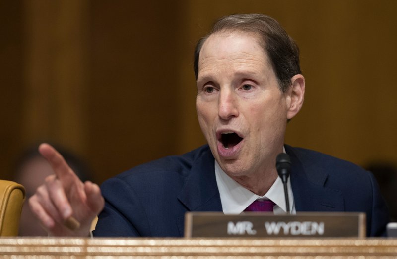 In this Nov. 28, 2017, file photo, Sen. Ron Wyden speaks during a committee hearing on Capitol Hill in Washington. For the first time, the U.S. government is publicly acknowledging the existence in Washington of what appear to be rogue devices that foreign spies and criminals could be using to track individual cellphones and intercept calls and messages. In a March 26 letter to Wyden obtained by the Associated Press, the Department of Homeland Security acknowledged that it identified suspected unauthorized cell-site simulators in Washington last year. (AP Photo/Carolyn Kaster, File)