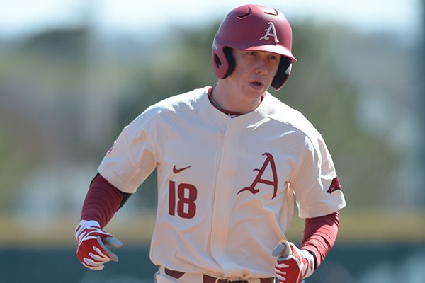 Arkansas outfielder Heston Kjerstad rounds third base after hitting a home run during a game against Louisiana-Monroe on Wednesday, April 4, 2018, in Fayetteville. 