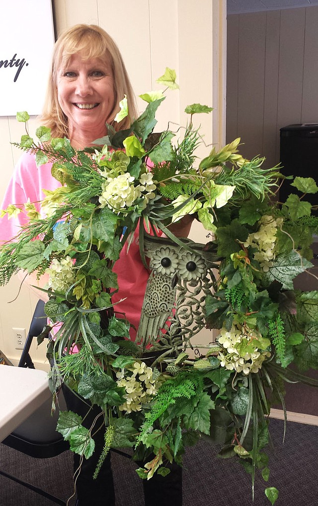 PHOTO SUBMITTED A pie and live auction of over 40 items and a framed print will be part of the McDonald County Historical Society's fifth Annual Spring Benefit for the Historic Courthouse and Museum. Pictured is a wreath designed by Jane Lant.