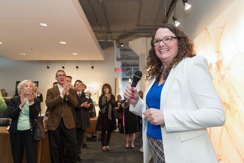 In a Wednesday, March 14, 2018 photo, Kara Eastman speaks at a fundraiser for her campaign at the Omaha Design Center, in Omaha, Neb. Thirteen women are on the list released Thursday of primary candidates for seats in the U.S. House of Representatives in Virginia, pushing the number of women on ballots for U.S. House seats this year to 309. That tops the 2012 record of 298 female House candidates. 