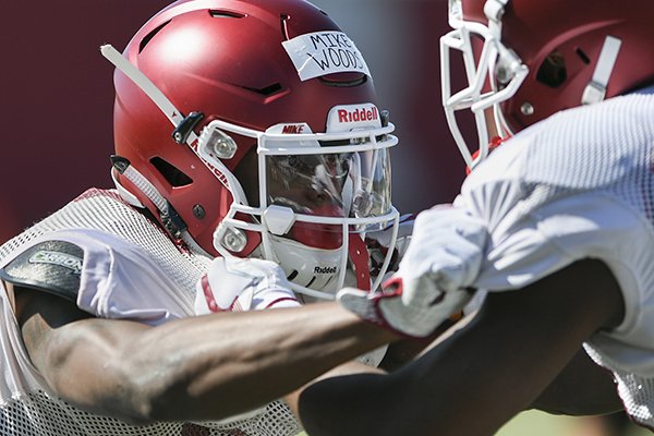 Arkansas receiver Mike Woods goes through practice Saturday, March 3, 2018, in Fayetteville. 