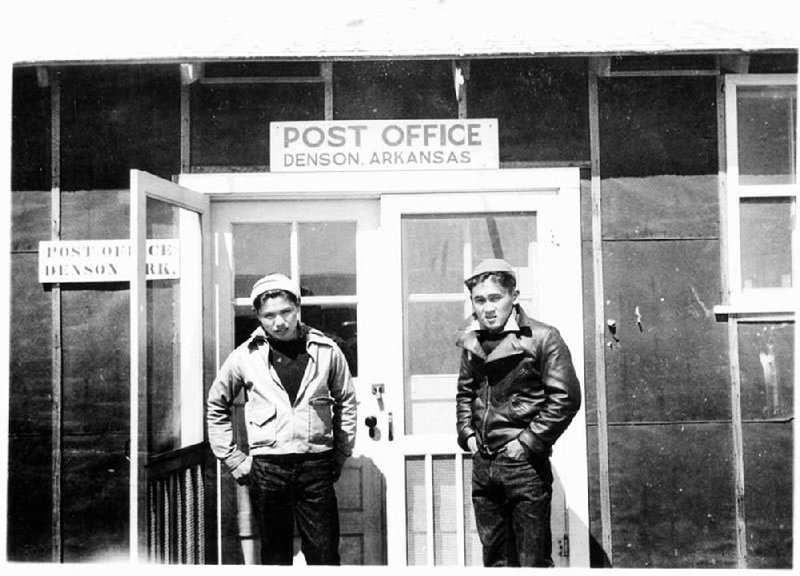 Fred Shimasaki (left) and Kiyo Renze are pictured at the Post Office in 1942. Shimasaki and his family were taken from California to the Japanese internment camps at Jerome and Rohwer during World War II. He is returning to Arkansas with a group from California on a pilgrimage to the camps and to mark the fifth anniversary of the Japanese American Internment Museum in McGehee. 
