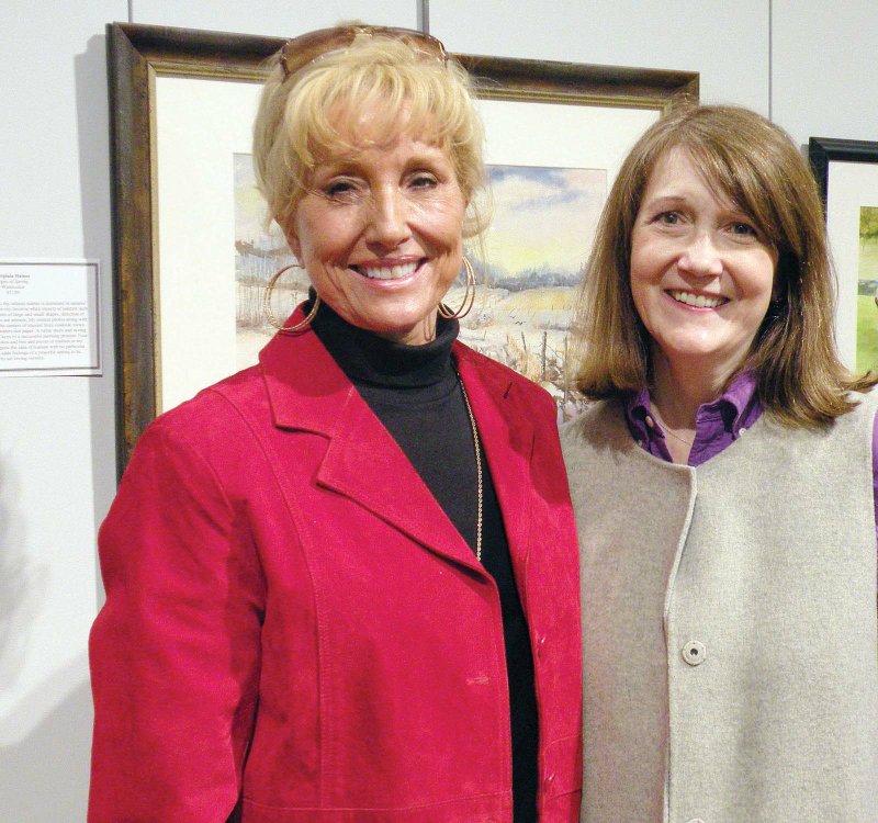 Charlotte Rierson of Fairfield Bay, left, and Nina Ruth Baker of Conway attend the opening reception of the 48th annual Mid-Southern Watercolorists juried exhibition March 9 in Little Rock. Other local artists with work in the exhibit are Mary Ann Stafford of Maumelle and Suzann Waggoner of Mount Vernon.