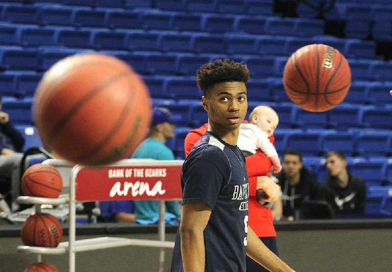 Baptist Prep's Issac McBride practices with his team at Bank of the Ozarks Arena Friday, March 9, 2018. 