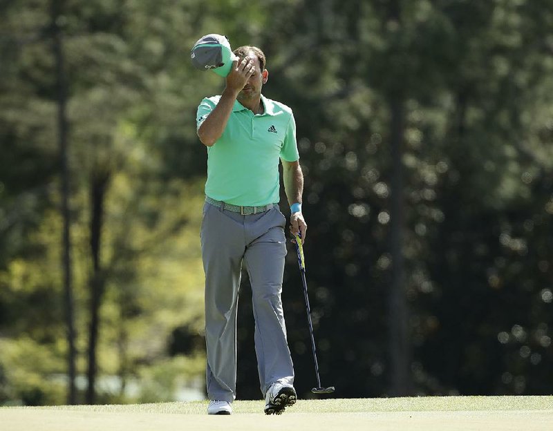 Sergio Garcia put five balls in the water on the 15th hole Thursday at the Masters, making a bad day for he and his family.  