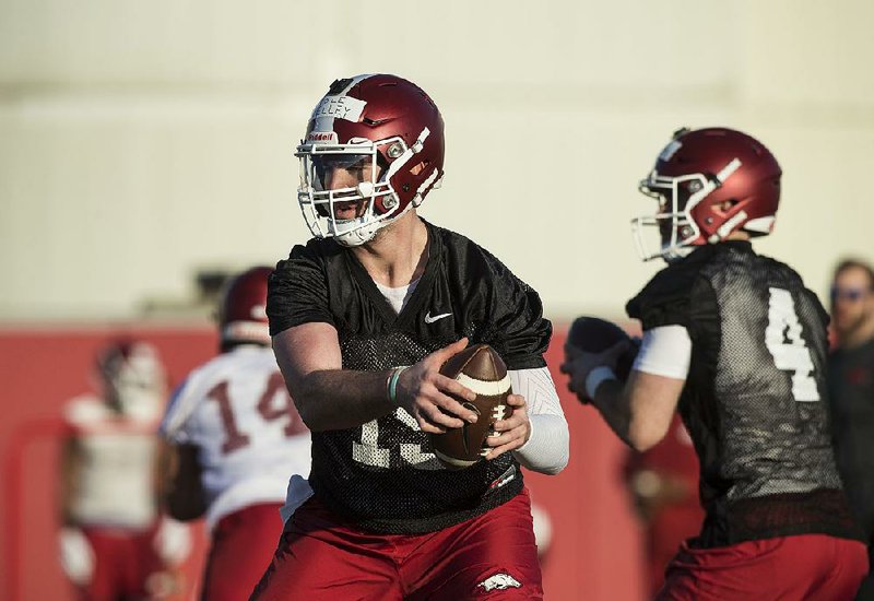 NWA Democrat-Gazette/BEN GOFF @NWABENGOFF
Cole Kelley, Arkansas quarterback, runs a drill Thursday, March 1, 2018, during Arkansas spring football practice at the Fred W. Smith Football Center in Fayetteville. 