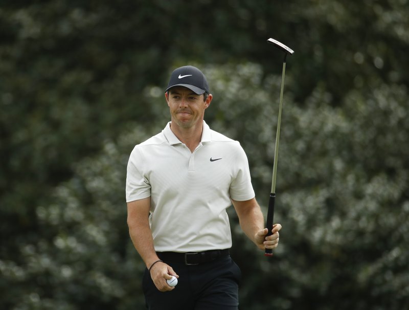 Rory McIlroy, of Northern Ireland, reacts after a birdie on the 14th hole during the second round at the Masters golf tournament Friday, April 6, 2018, in Augusta, Ga. (AP Photo/Charlie Riedel)