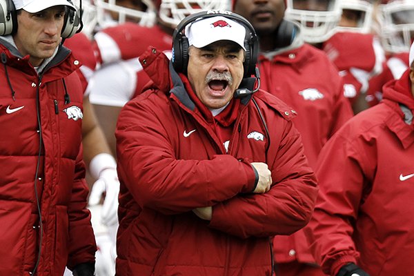 Arkansas defensive coordinator John Chavis yells to players during the Razorbacks' spring game Saturday, April 7, 2018, in Little Rock. 