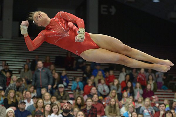 Arkansas' Amanda Wellick competes Friday, Jan. 12, 2018, in the vault portion of the 11th-ranked Razorbacks' meet with sixth-ranked Kentucky in Barnhill Arena in Fayetteville. 