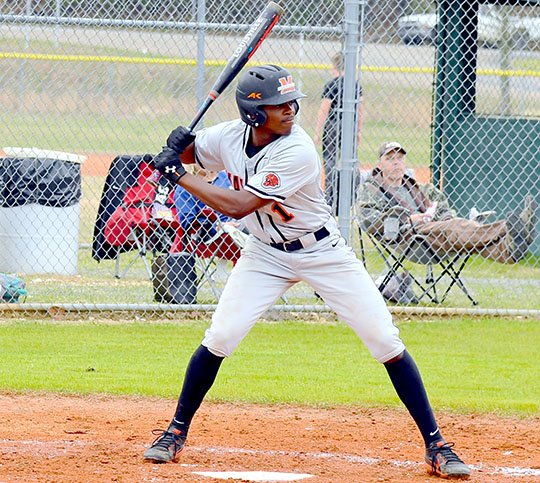 The Sentinel-Record/Grace Brown - Malvern's Demias Jimerson (1) stands at bat during a game against Fountain Lake at Fountain Lake on Monday, April 2, 2018.