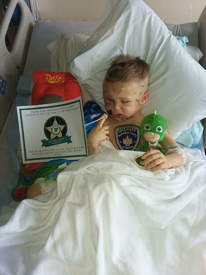 Matthew Guess, a 4-year-old recovering from severe injuries sustained in a dog attack on Thursday, April 5, 2018, was named an honorary Washington County deputy sheriff.