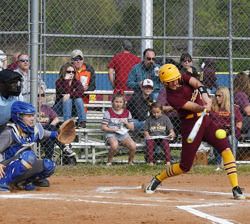 The Sentinel-Record/Grace Brown JUNIOR SLUGGER: Lake Hamilton's Lanette Snyder (7) connects with a pitch in Monday's 17-0 win over Lakeside. Snyder went 2-for-3 at the plate with two RBIs.