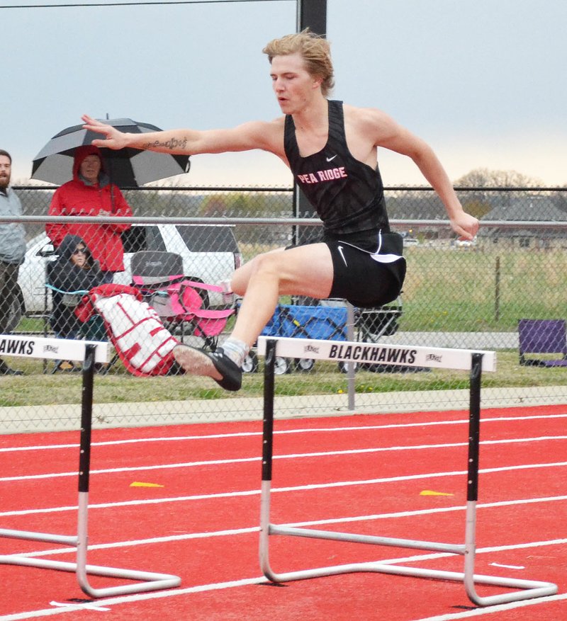 TIMES photograph by Annette Beard Blackhawk Zach Woods took second place in pole vault clearing 12'6".