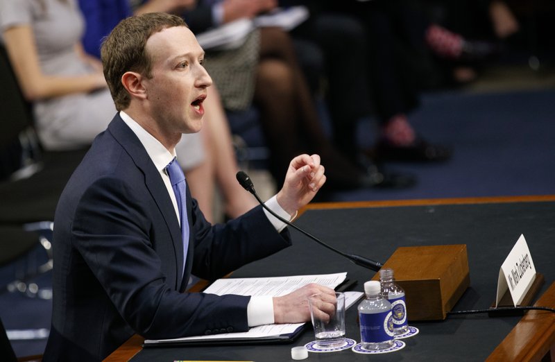 The Associated Press FACEBOOK CEO: Facebook CEO Mark Zuckerberg testifies before a joint hearing of the Commerce and Judiciary Committees on Capitol Hill in Washington, Tuesday about the use of Facebook data to target American voters in the 2016 election.