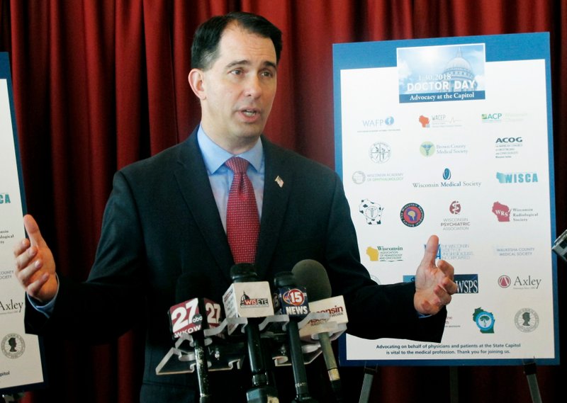 In this Jan. 30, 2018, file photo, Wisconsin Gov. Scott Walker speaks in Madison, Wis. The Trump administration is considering a plan that would allow states to require certain food stamp recipients to undergo drug testing, handing a win to conservatives who’ve long sought ways to curb safety net program. Walker sued the USDA in 2015 for blocking the state from drug testing adults applying for food stamps. A federal judge tossed the suit in 2016, but Walker renewed his request for permission later that year, after Donald Trump had won the presidency but before he took office.