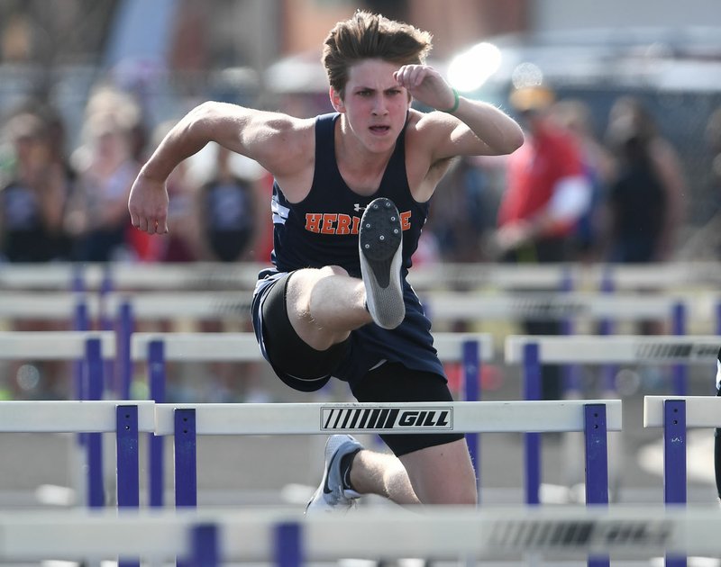 NWA Democrat-Gazette/J.T. WAMPLER Rogers Heritage's Liam Alderson competes in the 110 meter hurdles Wednesday April 11, 2018 at the Bulldog Relays in Fayetteville.