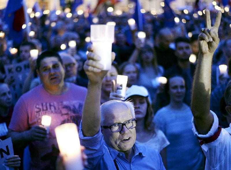 A Riverfront Park candlelight vigil protests the Trump administra-tion’s collusion with Sinclair Broadcasting to blame the ﬂuctuating weather on Mexico. Fayetteville-born Otus the Head Cat’s award-winning column of humorous fabrication appears every Saturday.