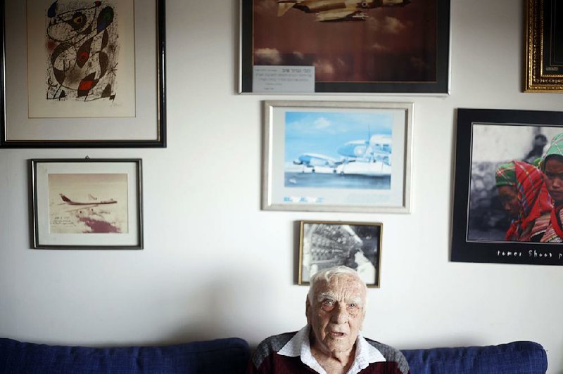 Holocaust survivor Baruch Shub poses for a photo at his apartment in a retire-ment home in Kfar Saba, Israel. 
