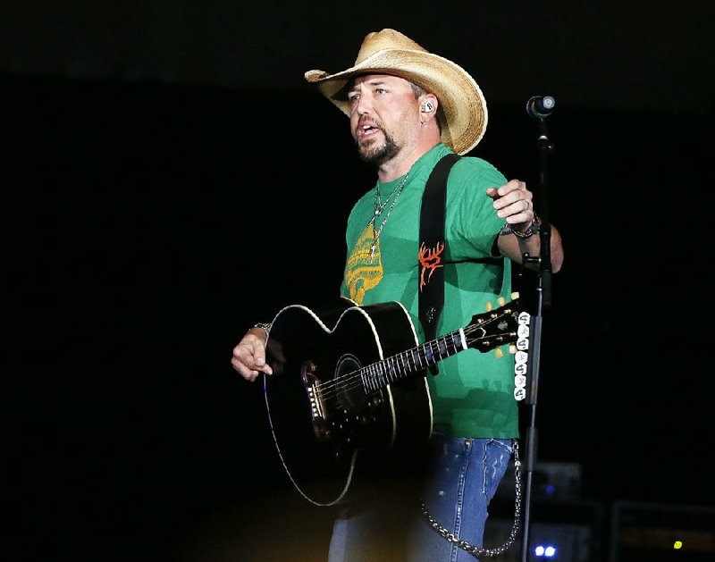 Jason Aldean speaks to the crowd in Tulsa on Oct. 12. It was his first performance after the Oct. 1 shootings in Las Vegas. He performed at Verizon Arena in North Little Rock on Oct. 13.