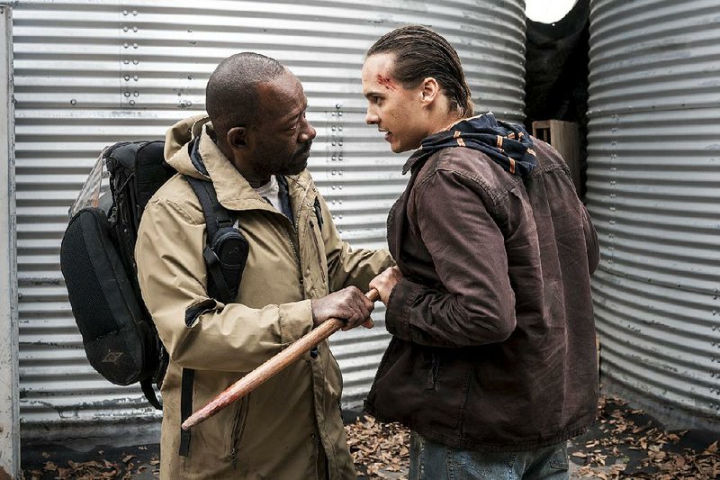 The Walking Dead’s Morgan Jones (Lennie James, left) switches series and meets Nick Clark (Frank Dillane) on Fear the Walking Dead. Season 4 debuts at 9 p.m. today on AMC following the Season 8 ﬁnale of The Walking Dead.
