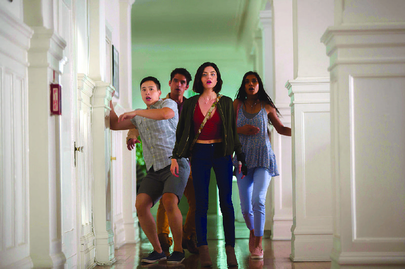 Brad (Hayden Szeto), Lucas (Tyler Posey), Olivia (Lucy Hale) and Penelope (Sophia Taylor Ali) are menaced by an ancient demon who wants to play a game in Jeff Wardlow’s horror movie Truth or Dare. 
