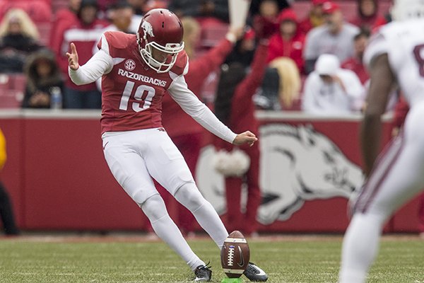 Arkansas' Connor Limpert kicks off during a game against Mississippi State on Saturday, Nov. 18, 2017, in Fayetteville.