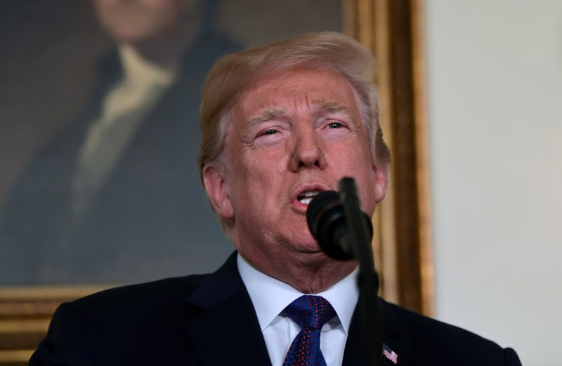 President Donald Trump speaks in the Diplomatic Reception Room of the White House on Friday, April 13, 2018, in Washington, about the United States' military response to Syria's chemical weapon attack on April 7. (AP Photo/Susan Walsh)

