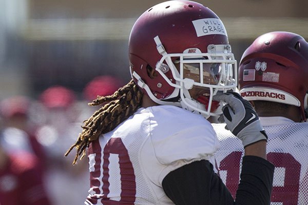 Arkansas tight end Will Gragg goes through practice Saturday, March 3, 2018, in Fayetteville. 
