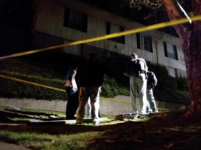 Officers investigate after a police shooting early Friday in Little Rock.