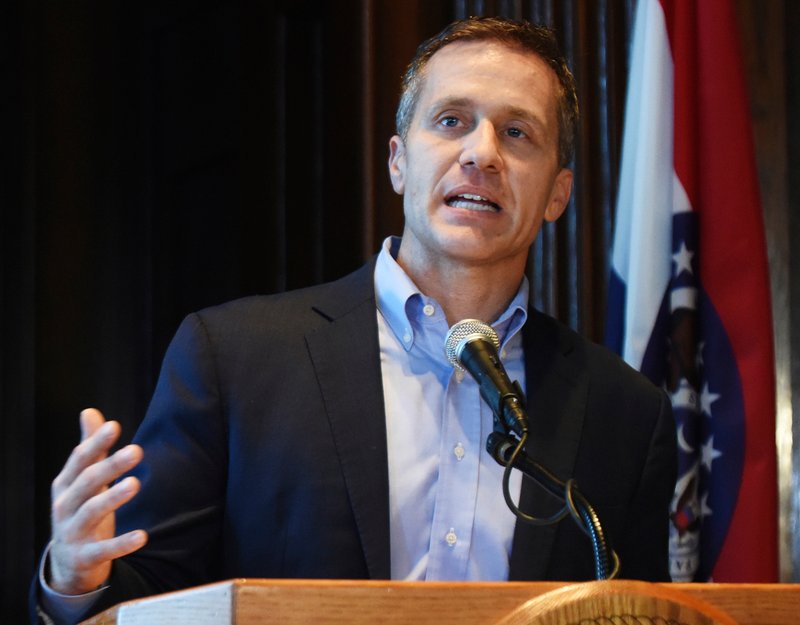 Missouri Gov. Eric Greitens speaks at a news conference about allegations related to his extramarital affair with his hairdresser, in Jefferson City, Mo., Wednesday, April 11, 2018. Greitens initiated a physically aggressive unwanted sexual encounter with his hairdresser and threatened to distribute a partially nude photo of her if she spoke about it, according to testimony from the woman released Wednesday by a House investigatory committee. (Julie Smith/The Jefferson City News-Tribune via AP)