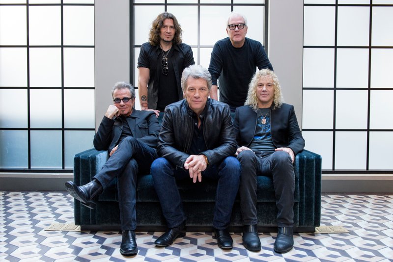 In this Oct. 19, 2016 file photo, members of Bon Jovi front row from left, Tico Torres, Jon Bon Jovi, David Bryan, back row from left, Phil X, and Hugh McDonald pose for a portrait in promotion of their new album "This House is Not for Sale" in New York. The band will be inducted to the Rock and Roll Hall of Fame on April 14, 2018 in Cleveland, Ohio. (Photo by Drew Gurian/Invision/AP, File)